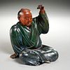 Japanese carved wood figure of a seated monk