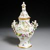 Meissen style gilt, enameled porcelain covered urn