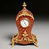Aiguilles Louis XV style tooled leather clock
