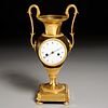 Empire gilt and patinated bronze urn clock