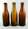 3 Coca Cola Arrow Amber bottles
