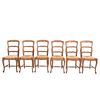 Lote de 6 sillas. Francia. Siglo XX. Estilo Luis XV. En talla de madera de roble. Con respaldos escalonados y asientos de palma.