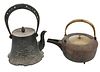 Two Japanese Iron and Brass Lidded Teapots