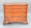 Chippendale Cherry Reverse Serpentine Front Chest having reverse serpentine top with four shaped corners over four conforming drawer...