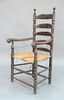 Ladder Back Great Chair with five arch slats supported by turned posts having arms with rams horns on turned supports with turned stretchers in old br