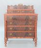 Sheraton Chest having gallery back over two drawers over four drawers on turned legs, overall grain painted with mahogany drawer fro...