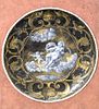 Limoges Enameled Plate, on copper, Renaissance style having God of thunder cherub and nude on chariot in clouds.
diameter: 9 5/8".