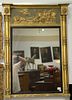 French Trumeau Mirror, gilt and gesso polychrome top panel having neoclassical scene with chariot led by lions.
43" x 30 1/2".