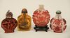 Group of Four Chinese Snuff Bottles, two glass bottles having red overlay scrolling flowers, intricately carved fish and vases, cinn...