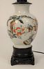 Chinese Porcelain Warrior Vase having hand-painted landscape with soldiers on horseback made into a lamp.
vase height: 10 1/2 inches...