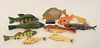 Group of Ten Fish, nine decoys, hand-carved wood with metal fins along with stuffed piranha.
5 inches - 9 inches.
Provenance: From t...