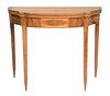 Federal Mahogany Games Table having D-shaped top over conforming frieze with oval panel inlay all set on square tapered legs with do...