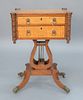 Duncan Phyfe Work Table having turret corners and two drawers on lyre base set on four downswept members ending in brass paw feet wi...