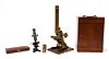 TWO ANTIQUE MICROSCOPES & WOODEN BOX