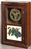 Two Seth Thomas mahogany miniature ogee clocks, 16'' h. and 15 3/4'' h.