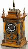 Ansonia Cabinet antique clock with an oak case, an eight-day spring driven movement