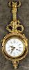 French ormolu wall clock, 19th c., with an enamel dial and Vincenti works, 22 3/4'' h.