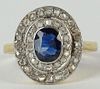 Lady's vintage French oval cut sapphire, diamond and 18 karat yellow gold ring.