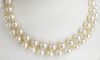 Vintage 7mm Pearl Necklace. Hand knotted. 9mm Pearl Clasp signed 14K.