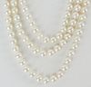 Lady's vintage three strand pearl necklace with 18 karat white gold.