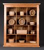 Small Collectible Basket Collection in Display Cabinet