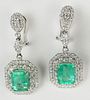 Pair of lady's approx. 4.52 carat emerald cut Colombian emerald