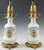 Pair of Old Paris Style Gilt Ormolu Mounted Porcelain Oil Lamps, 19th c., of baluster bottle form, with hand painted reserves of flo...