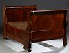 French Louis Philippe Carved Mahogany Lit du Coin, 19th c., the curved sleigh ends to a wide front rail, and a narrow rear rail, on...