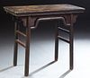 Chinese Mu Wood Wine Table, 19th c., the rectangular top on pierced curved bracket supports, to cylindrical legs joined by a stretche..