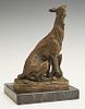 After Emanuelle Fremiet (1824-1910), "Seated Greyhound Tethered to a Tree Stump," 19th c., patinated bronze, signed on the front of...