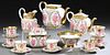 Nineteen Piece French Porcelain Tea and Coffee Service, 19th c., with gilt and hand painted floral decoration, consisting of seven c...