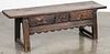 Spanish pine three-drawer bench, 19th/20th c., 18'' h., 54'' w., 15 3/4'' d. Provenance: DeHoogh Gallery