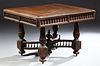 French Provincial Henri II Style Carved Oak Dining Table, c. 1880, the carved rounded edge and corner top over a spindled skirt on l...