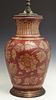 Oriental Porcelain Baluster Vase, 20th c., with leaf and floral decoration on a red ground, H.- 16 in., Dia.- 9 1/2 in.