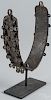 Early Nigerian handmade iron dog collar, likely Benin Empire, with engraved and hanging decoration