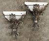 Set of four white metal wall sconces, early 20th c., 13'' h., 10 3/4'' w. Provenance: DeHoogh Gallery
