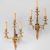 Set of Four Louis XVI Style Gilt-Bronze Three-Light Sconces