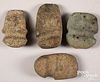 Four ancient stone axe heads
