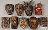 Nine carved and painted Mexican masks