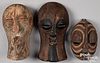 Three African Songye carved wood masks