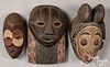 Three African carved and painted masks