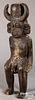 Carved African seated statue
