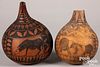 Two African decorated gourd bottle