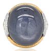 A 35.00CT STAR SAPPHIRE GOLD PLATINUM AND DIAMOND RING