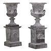 PAIR OF NEOCLASSICAL STYLE URNS ON PEDESTALS