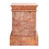 Pedestal. Siglo XX. En talla de mármol rosado jaspeado. Con cubierta rectangular, fuste liso y soporte rectangular. 65 x 46 x 36 cm