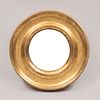 Espejo. Siglo XX. Diseño circular. Elaborado en madera dorada. Con luna circular convexa. 30 cm diámetro.