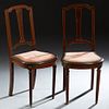 Pair of French Inlaid Mahogany Louis XVI Style Side Chairs, 20th c., the arched back over a tapered vertical center splat, to a cushioned bowed seat, 