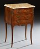 French Louis XVI Style Inlaid Carved Mahogany Marble Top Bombe Nightstand, 20th c., the rounded edge and corner ocher marble over three bowed drawers,