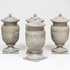Set of Four Neoclassical Style Gray and Polychrome Painted Wood and Composition Architectural Urns